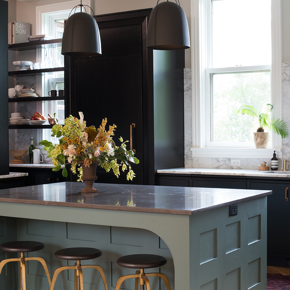 kitchen with teal paneled island