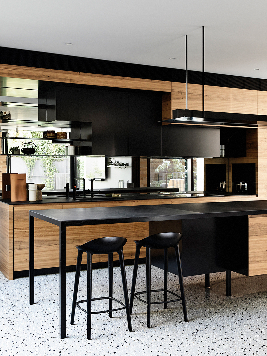 natural wood kitchen cabinets with black island