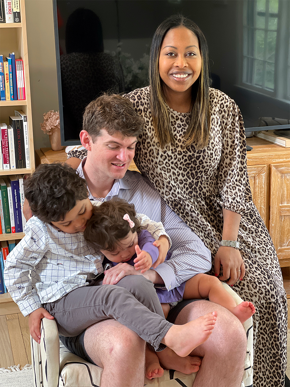 parents and two children on chair