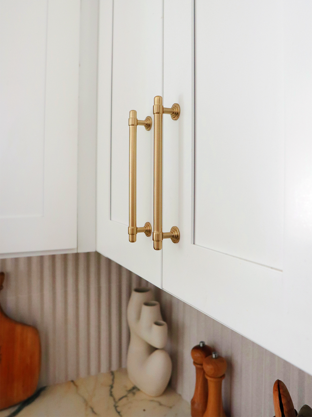 corner of kitchen with sculptural vessels