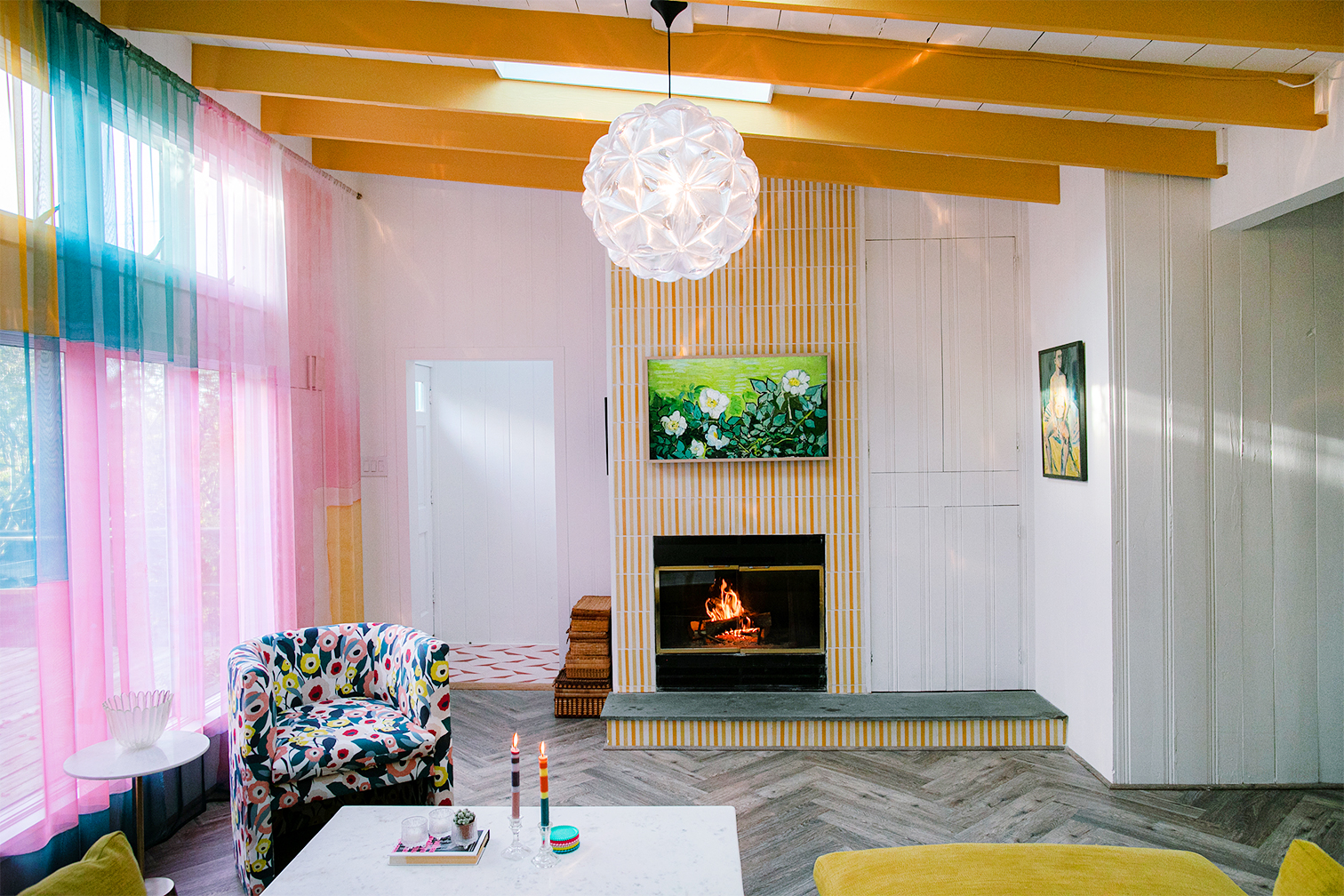 Fireplace with yellow tiles and Samsung Frame TV