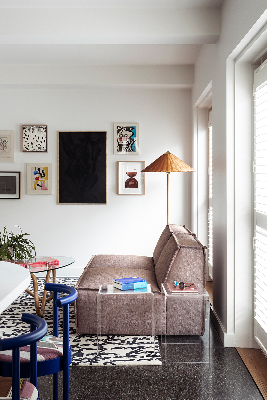 low-slung chunky sofa and gallery wall