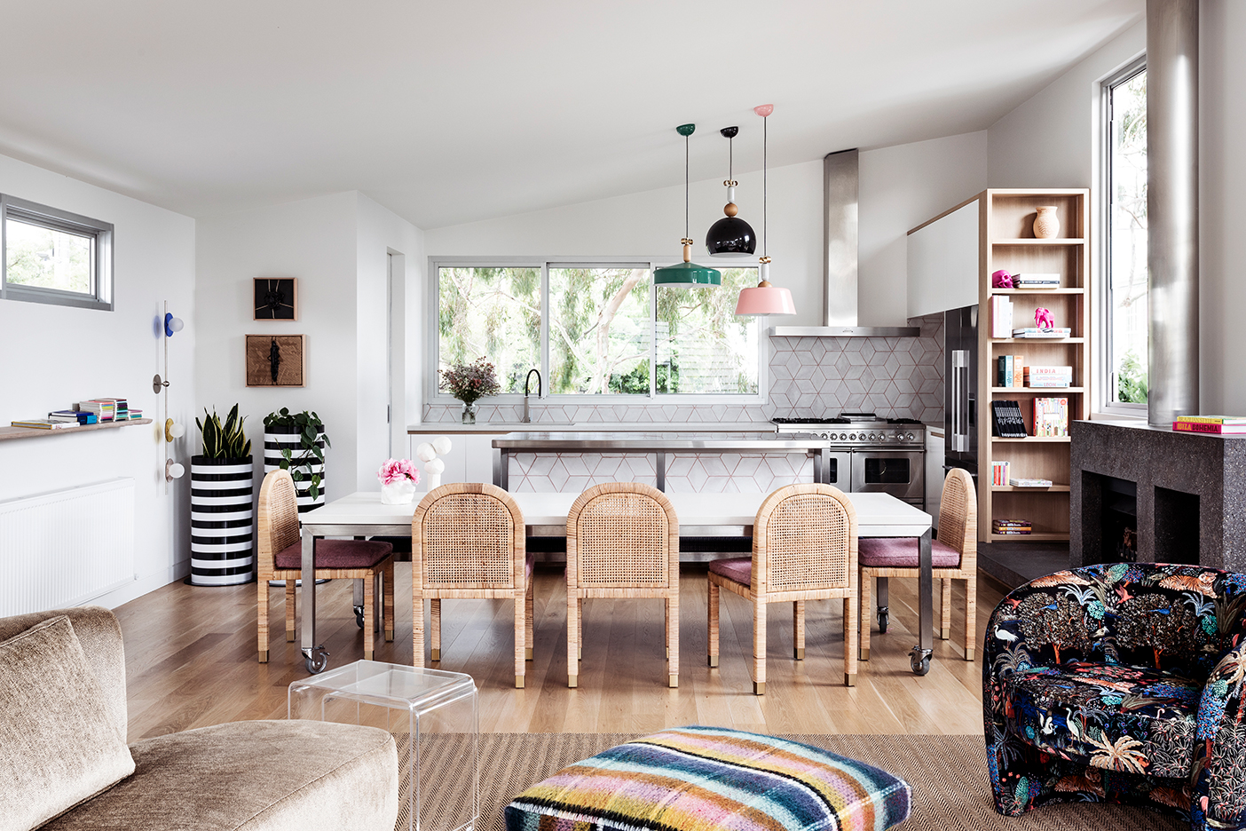 vaulted living room open to eat-in kitchen