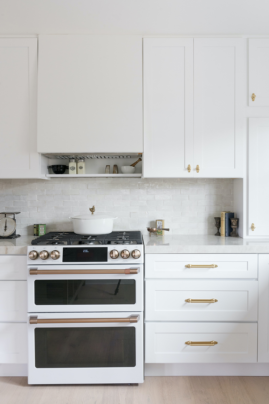 White kitchen with zellige tile backsplahs