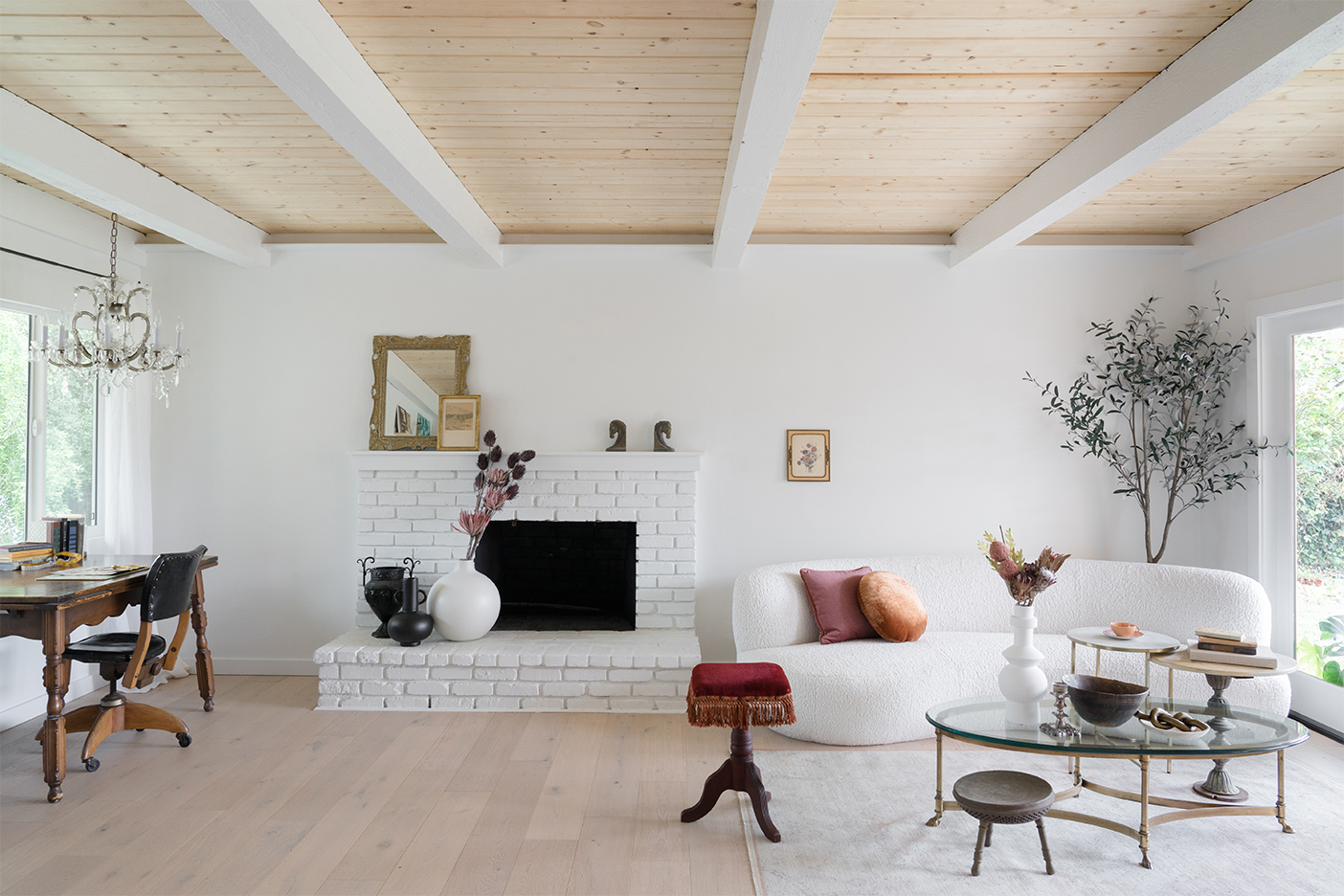 White living room with fireplace painted white