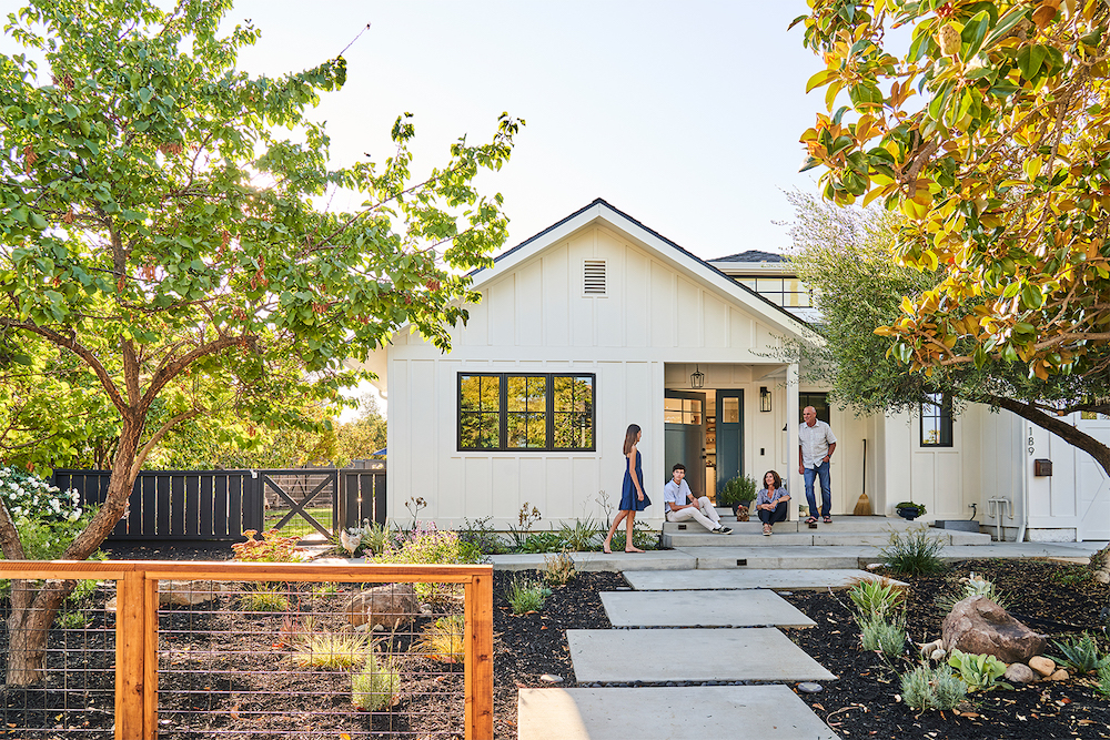 family outside house