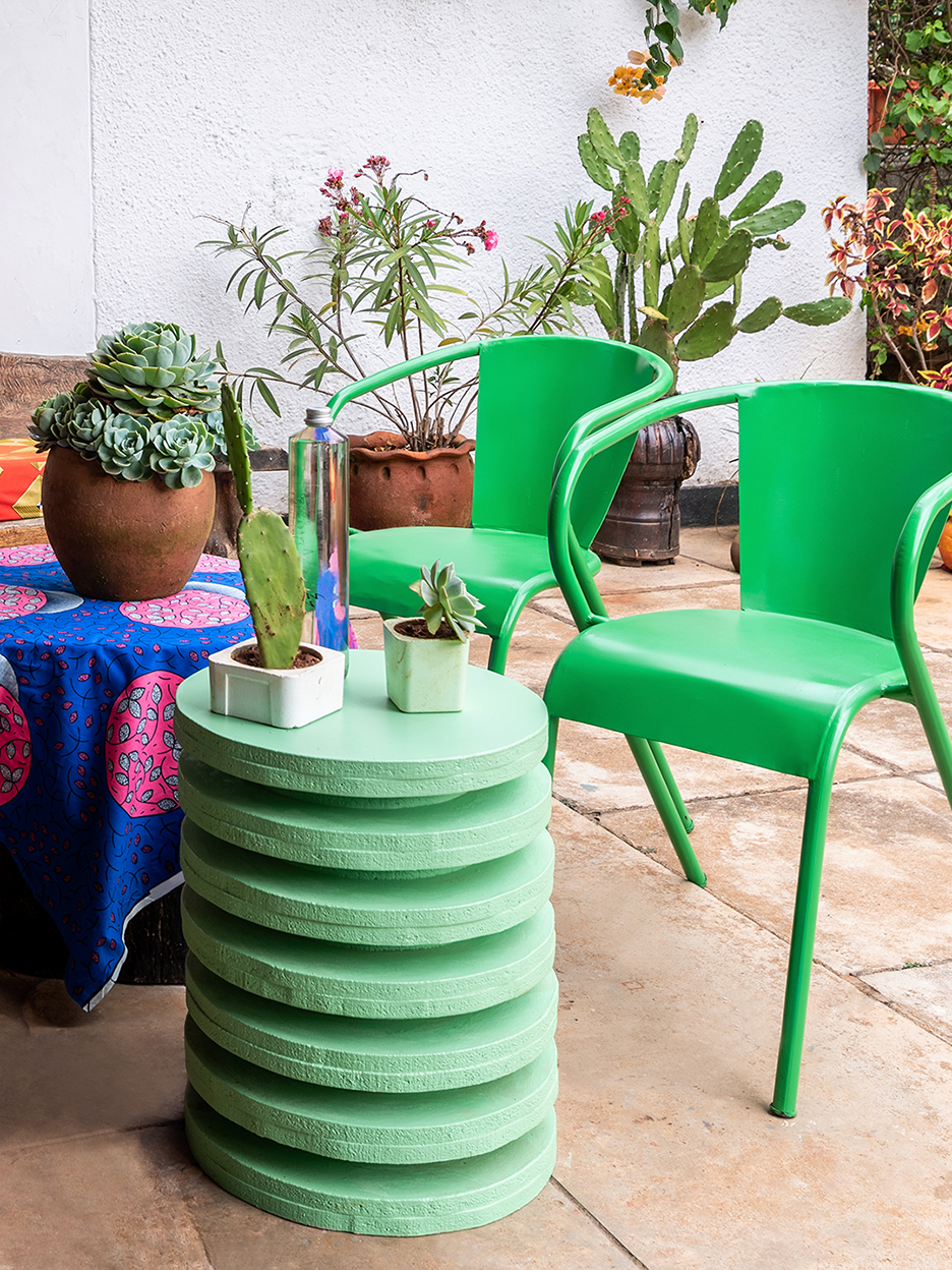 lime green chairs next to lime green stool