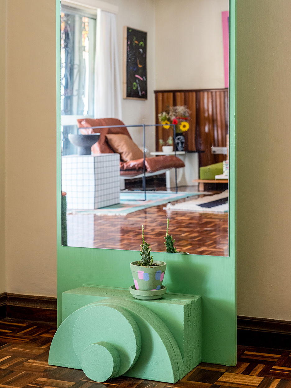 lime green floor mirror with geometric base