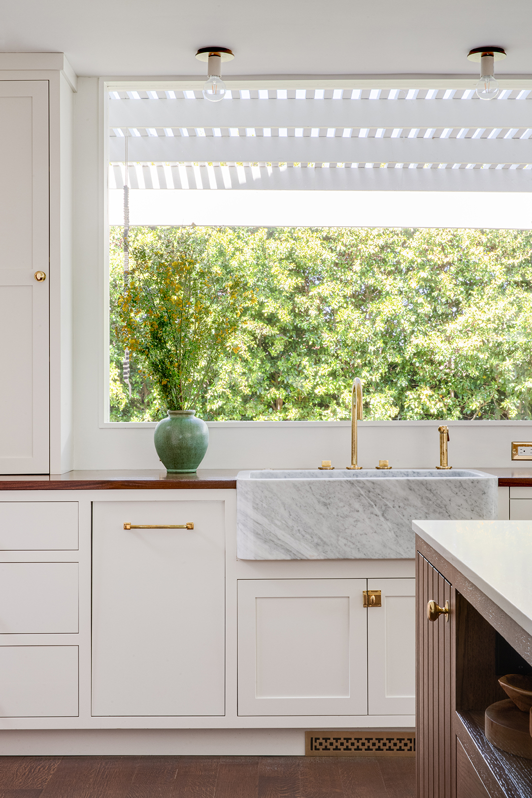 kitchen sink in front of window