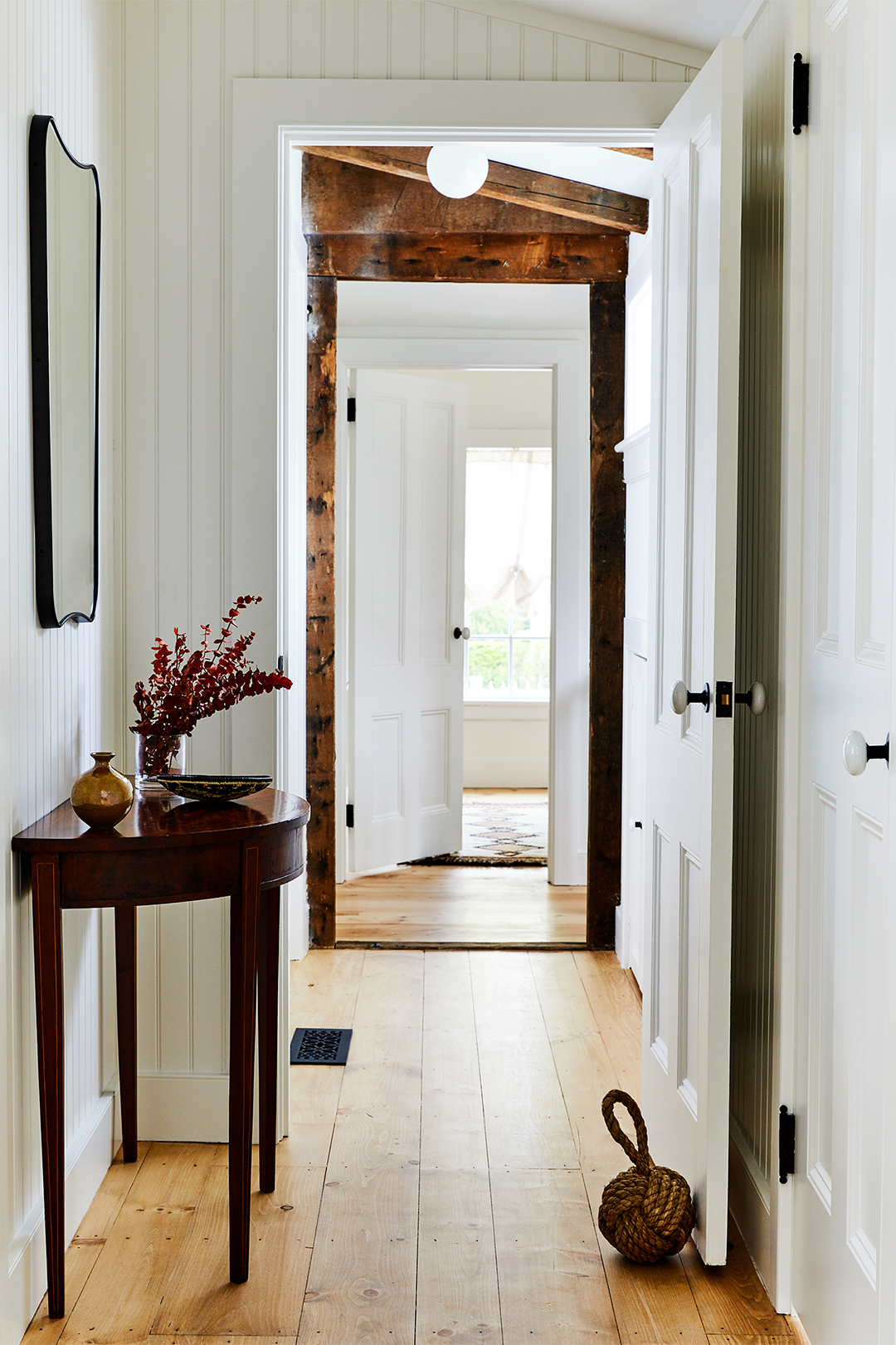 hallway with half-moon table