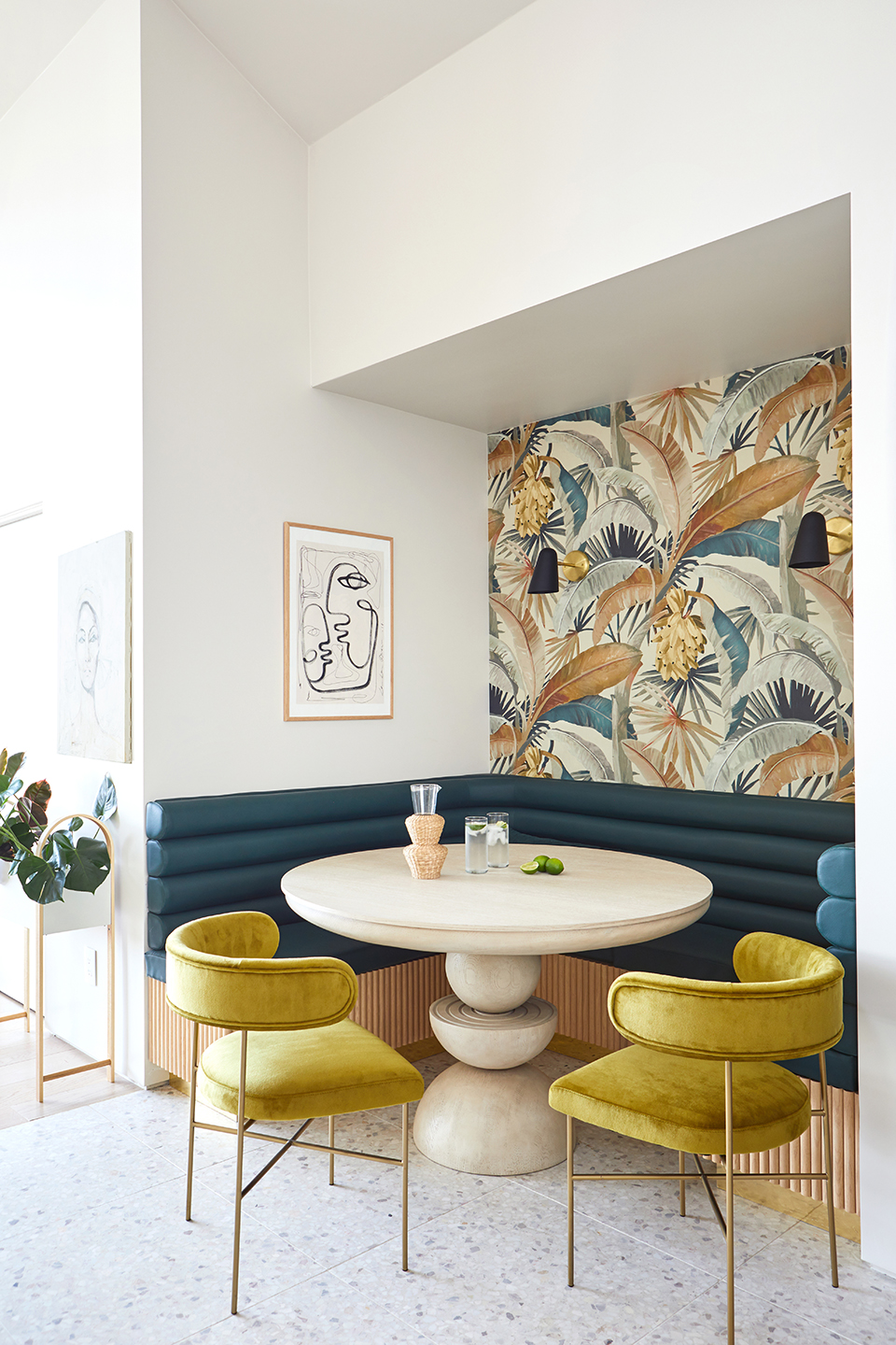 curved table and yellow dining chairs