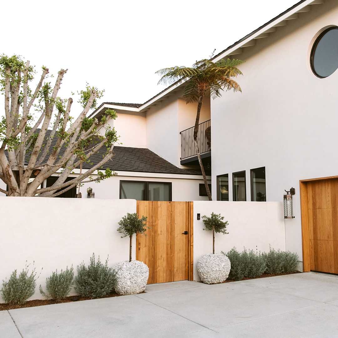 white hosue with wood doors