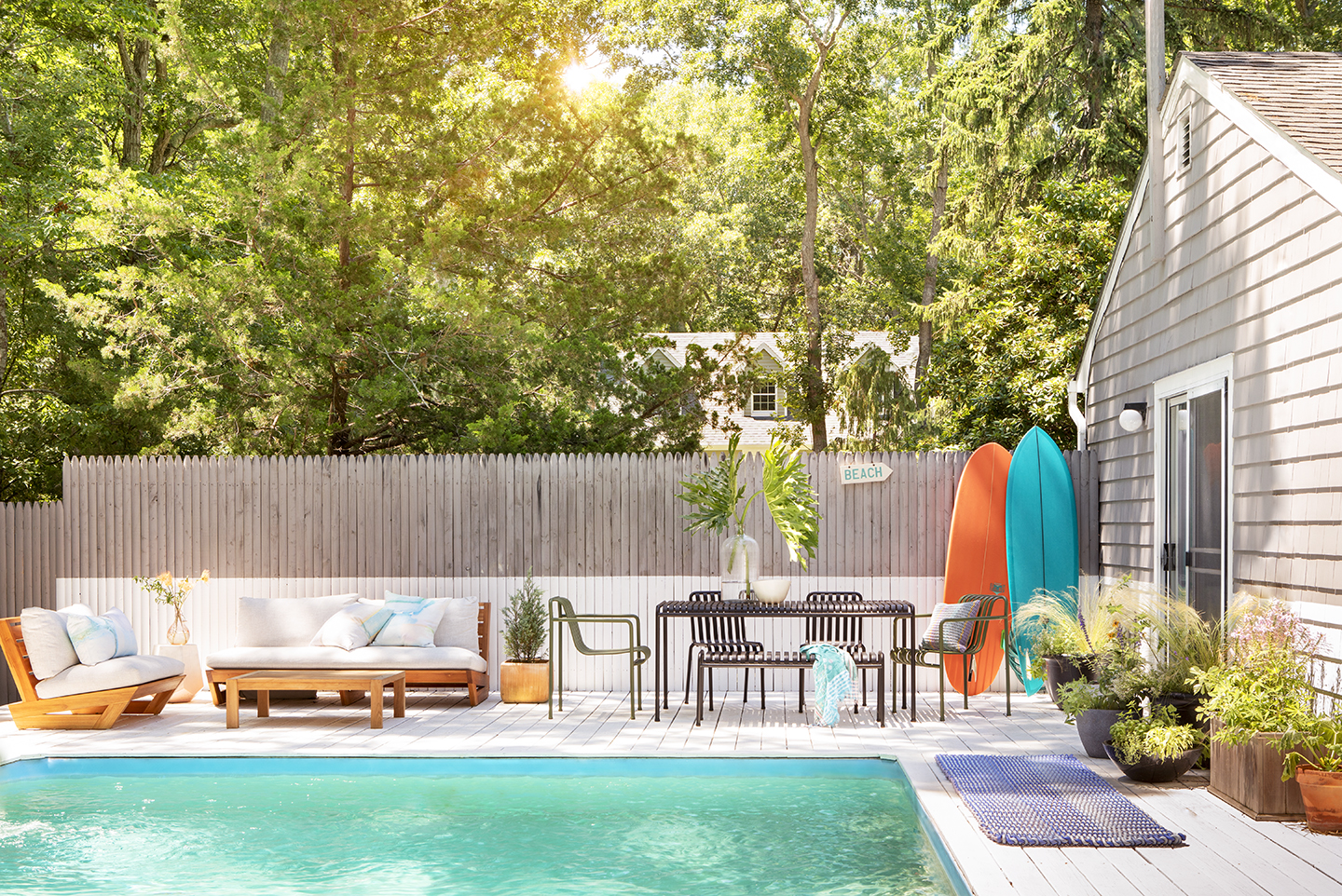 Pool areas with half of fence painted white