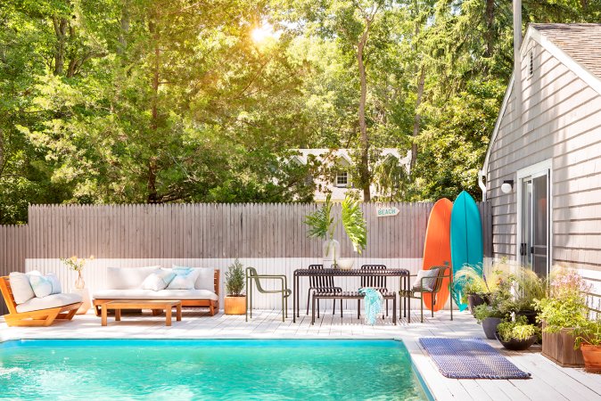 Pool areas with half of fence painted white