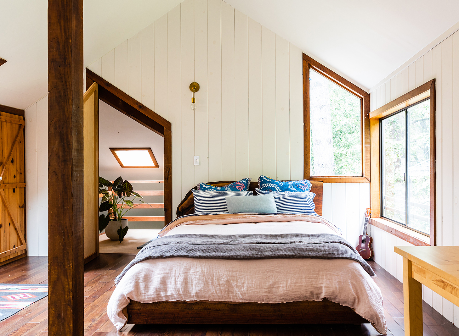 bedroom with shiplap walls