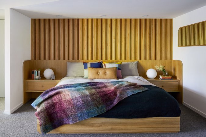 wood slatted built-in bed