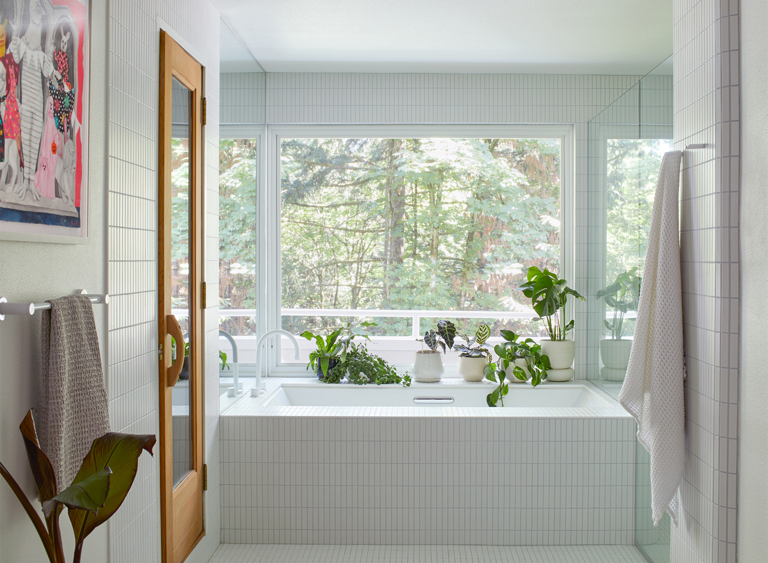 bright white-tiled bathroom