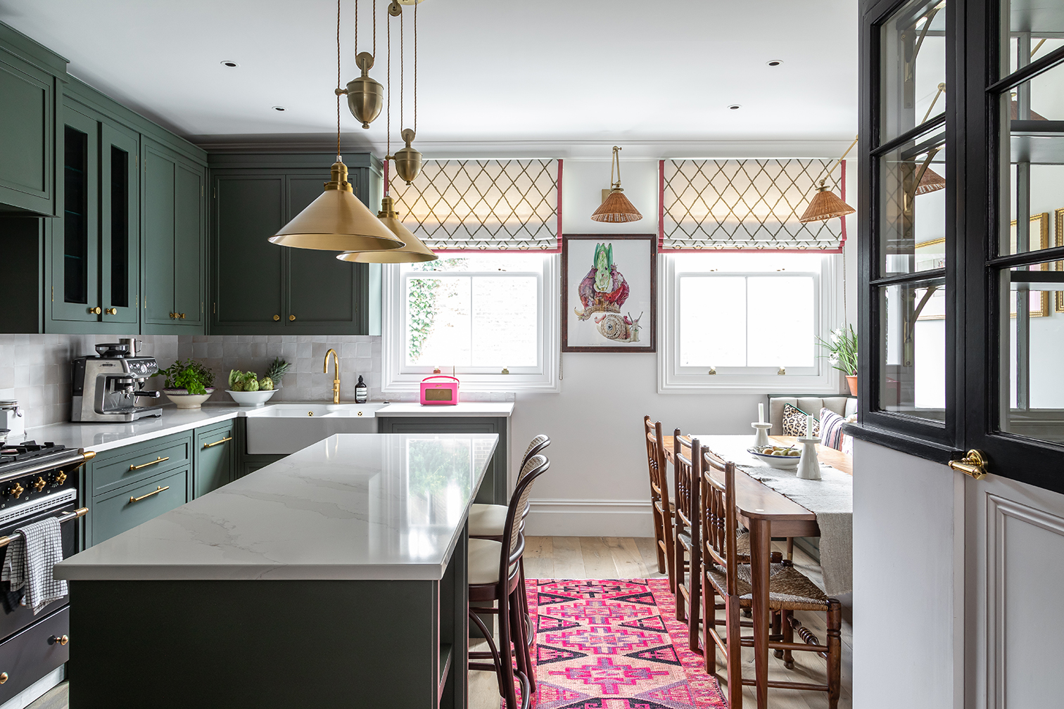 kitchen next to glass-paned pantry