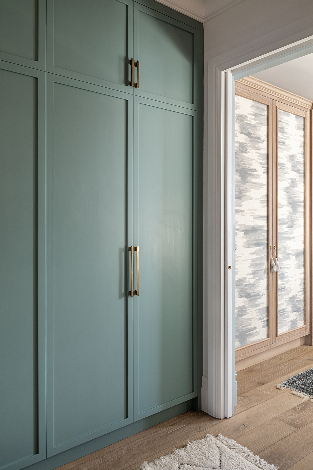 floor-to-ceiling olive green cabinet