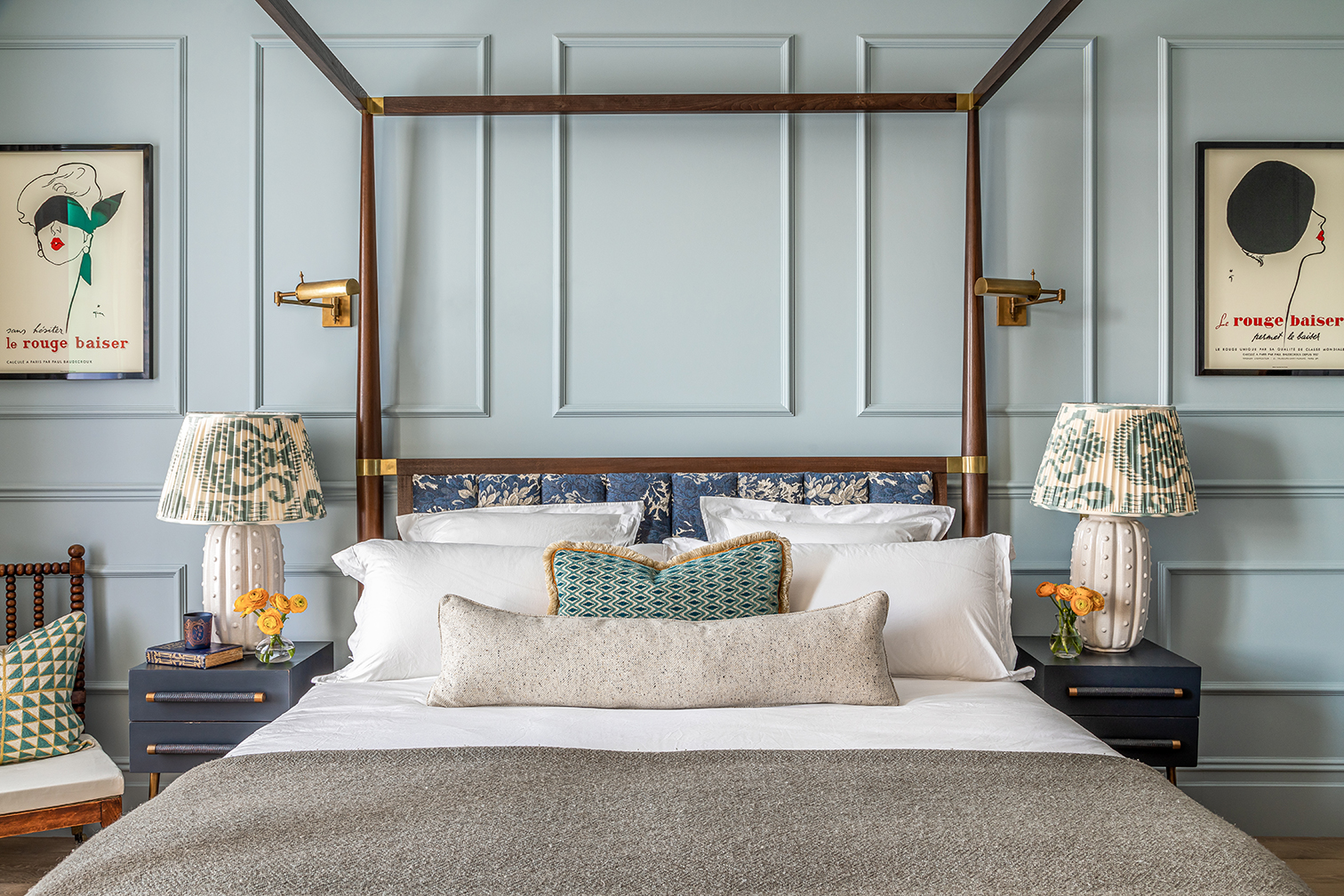 four-poster bed in pale blue room