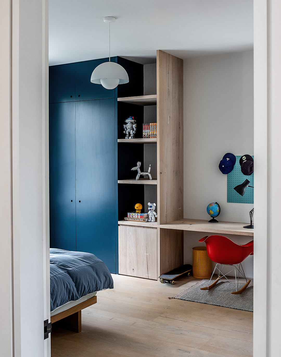 blue built-in cabinet in kids room