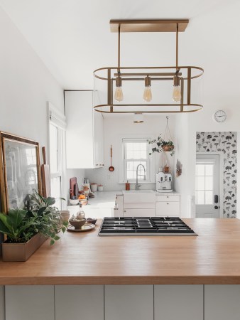 looking at white kitchen from island