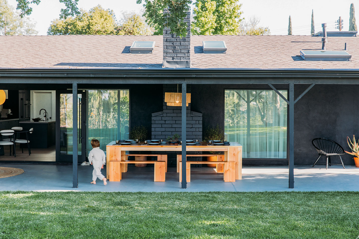 outdoor terrace with wood dining set