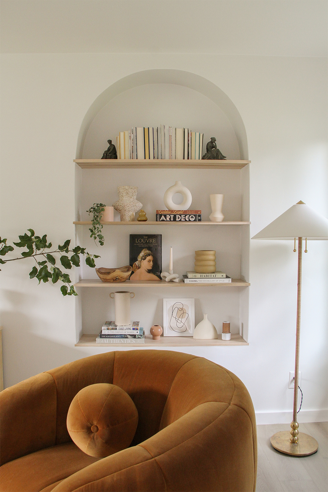 arched built in stocked with books