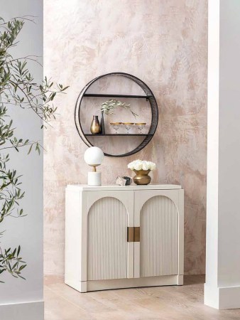 blush pink hallway with white console