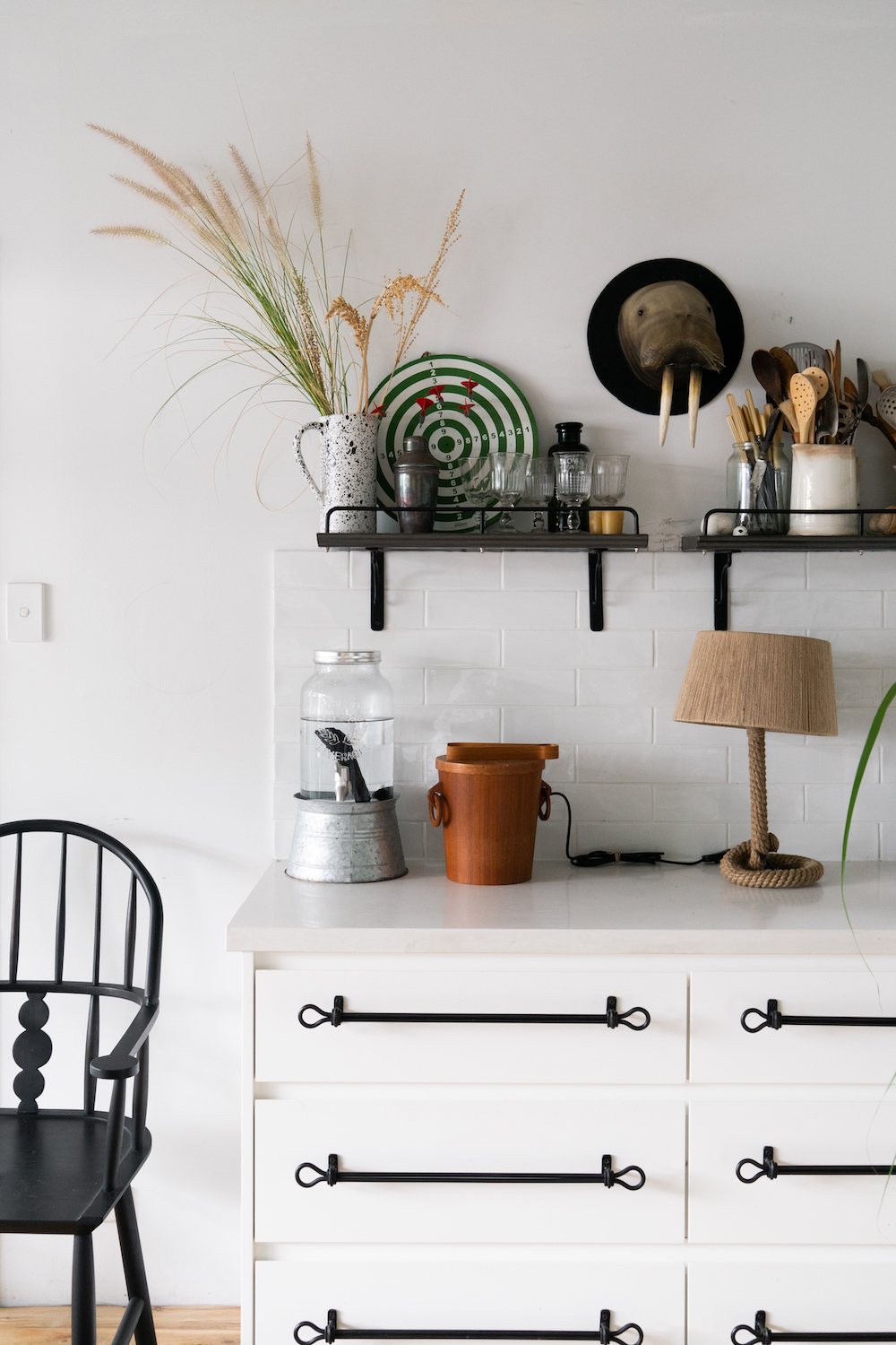 white cabinets with black drawer pulls