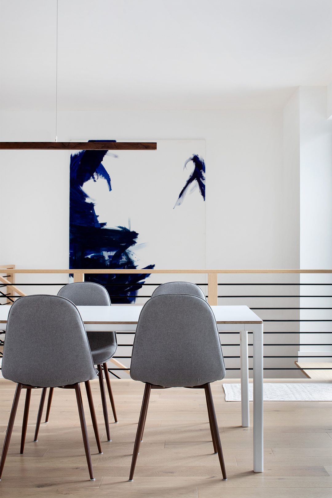 Dining Room with Walnut Light Fixture