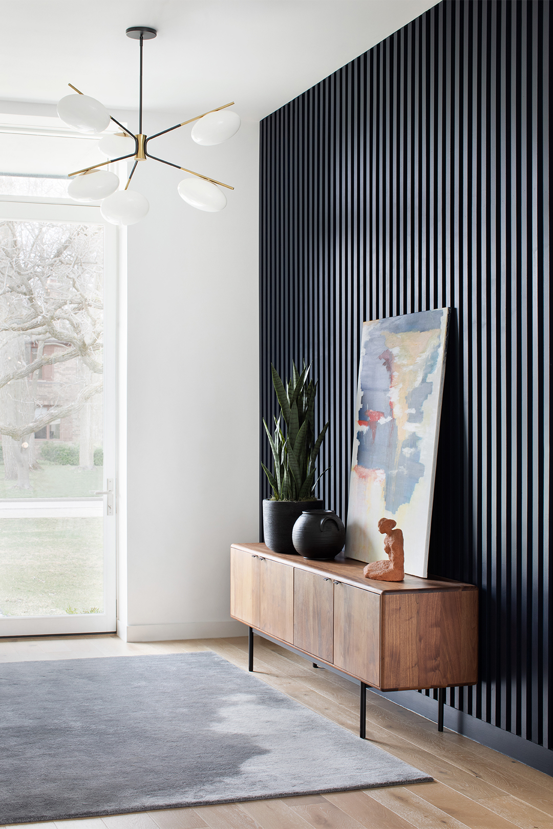 Navy Blue Wall With Walnut Buffet