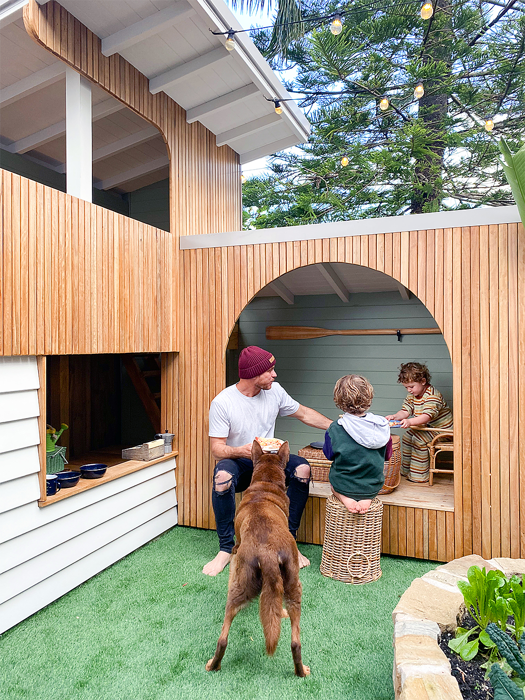 kids eating out of treehouse