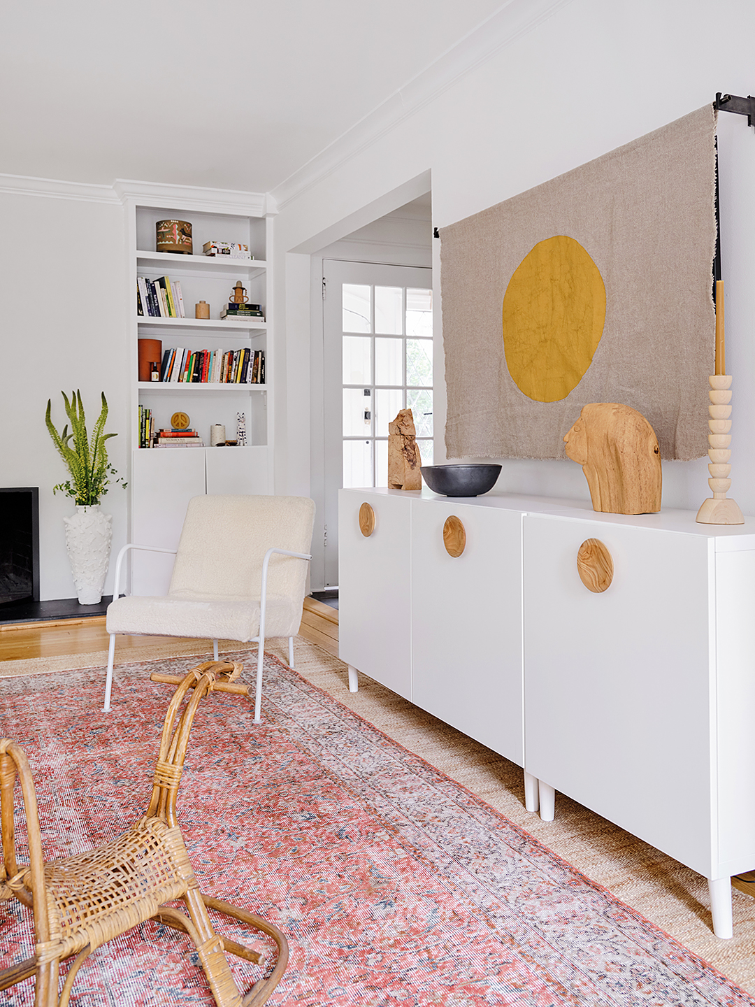 living room with fabric covering tv