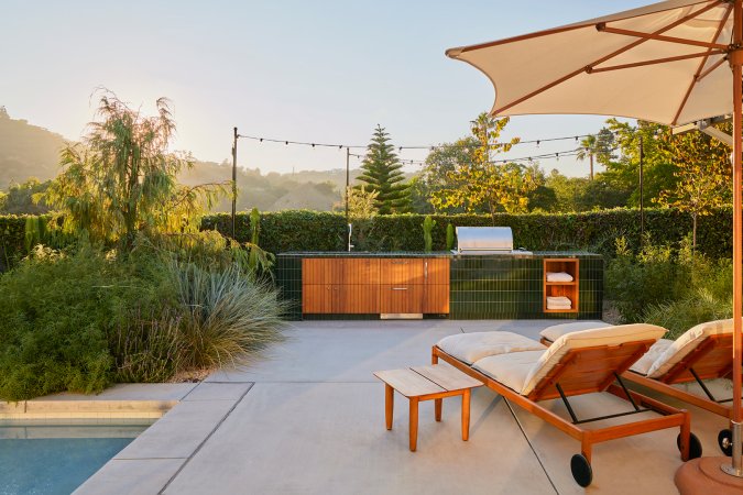 outdoor green tiled kitchen