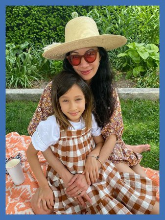 mother and daughter in a garden