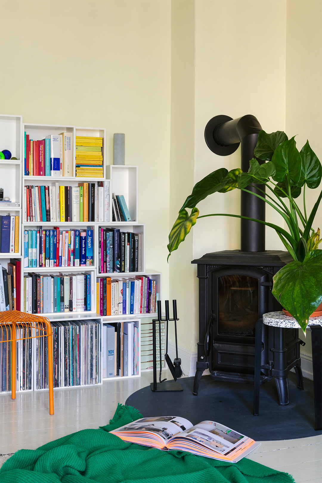 bookcase with black fireplace