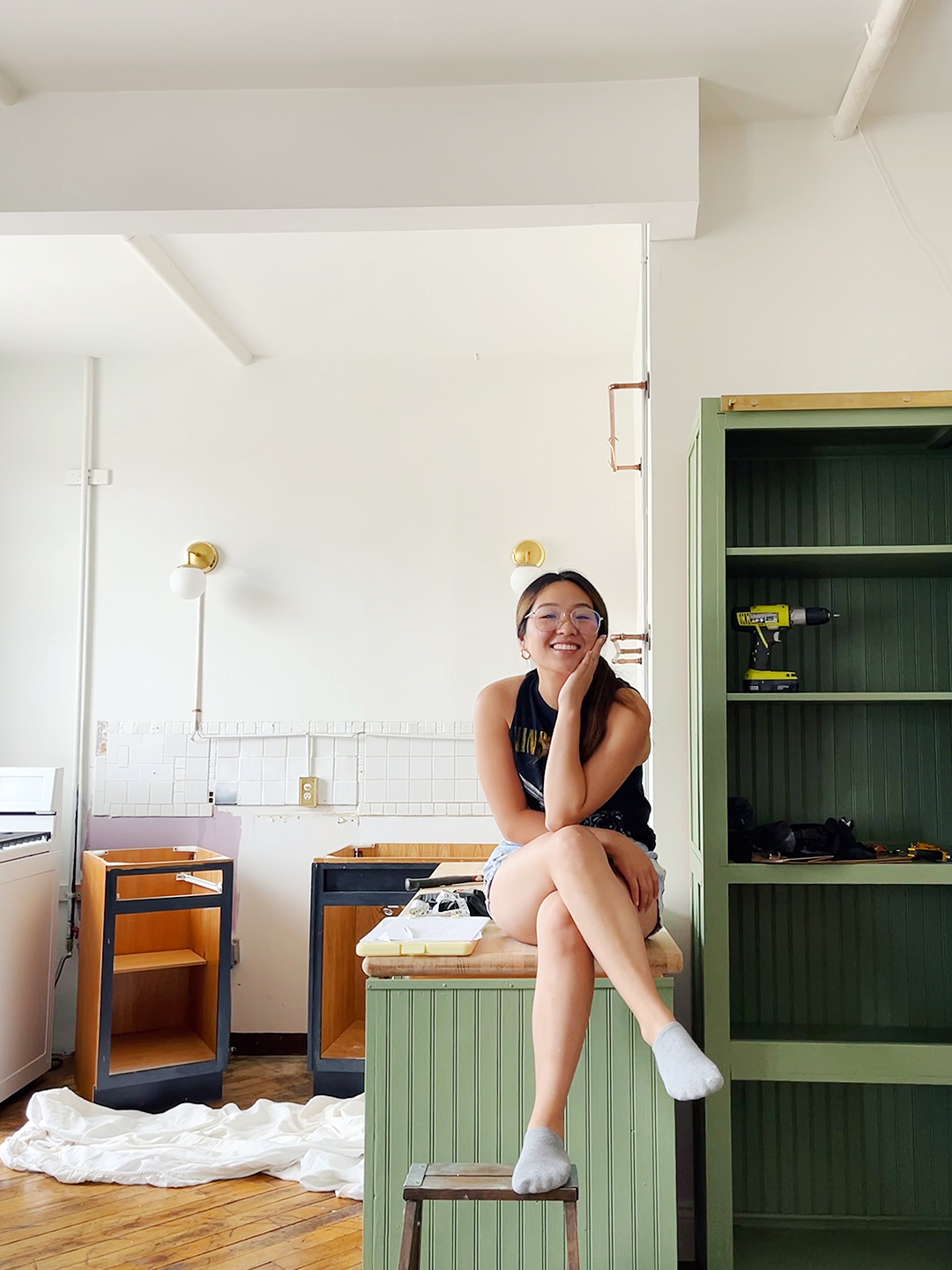 woman sittong on countertop