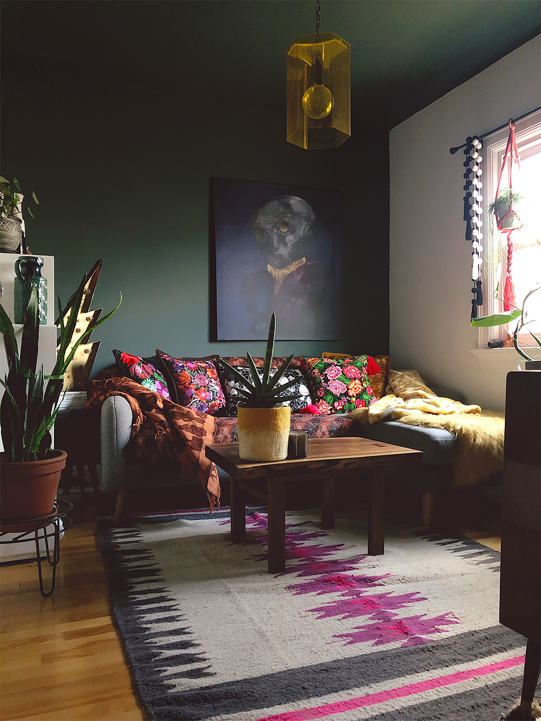 Living room with black wall and ceiling