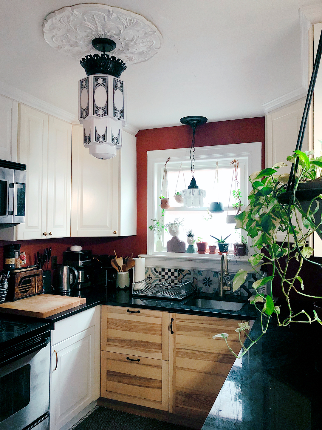 Kitchen with black countertops