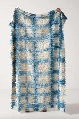  White and blue throw blanket