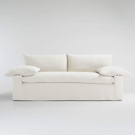  White slipcovered sofa