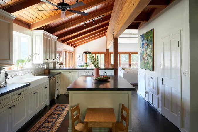 kitchen with island and wooden kids table