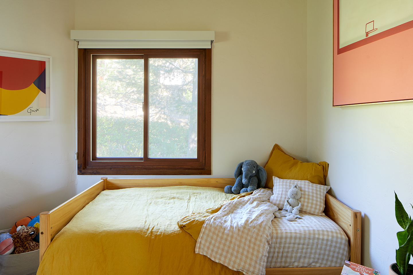 kid's bedroom with yellow bedding.