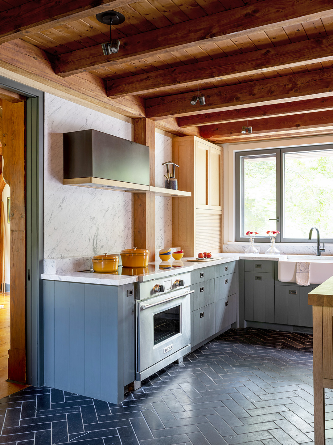 kitchen stove with blue cabinets