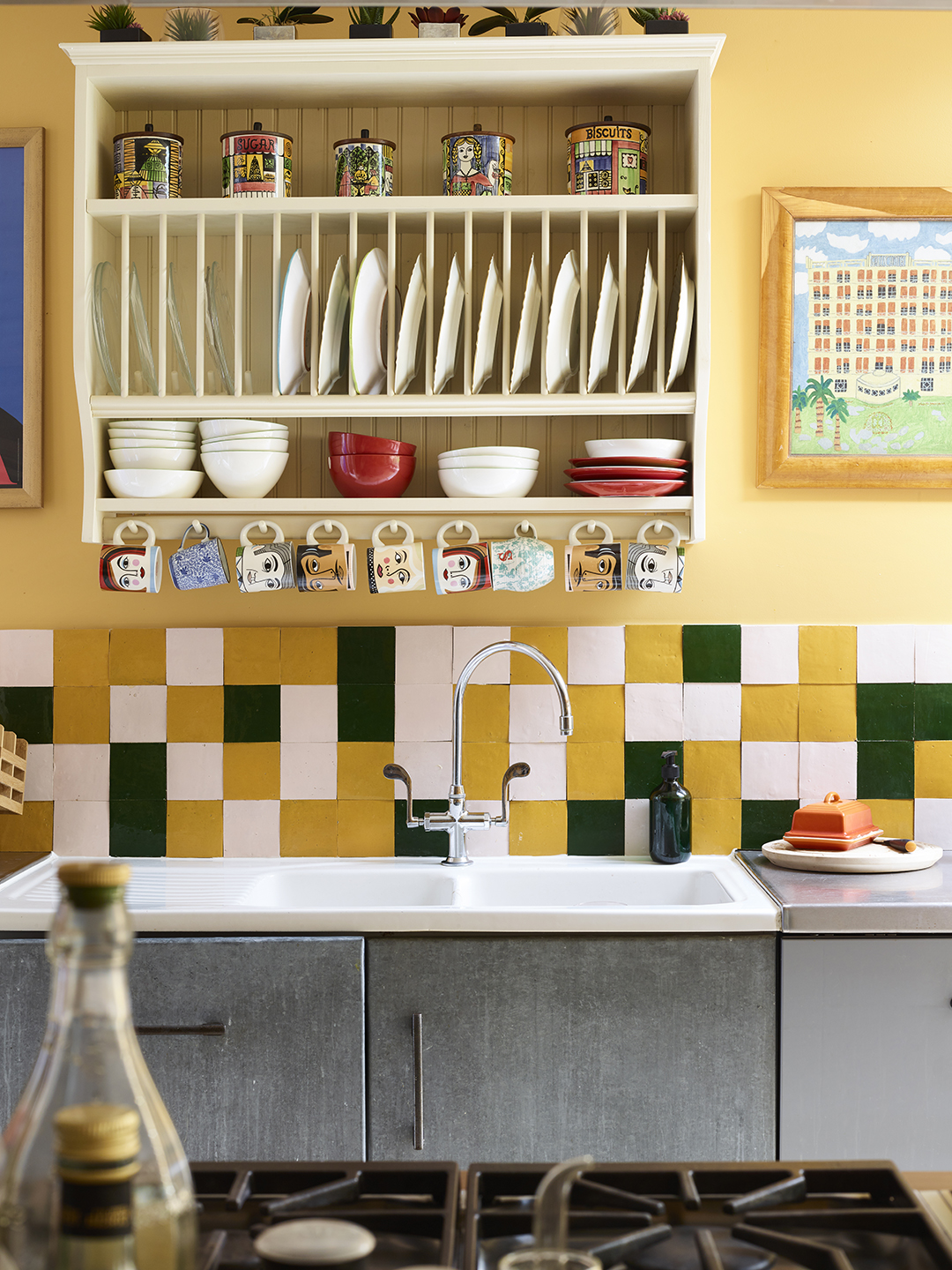 farmhouse sink with yellow tile