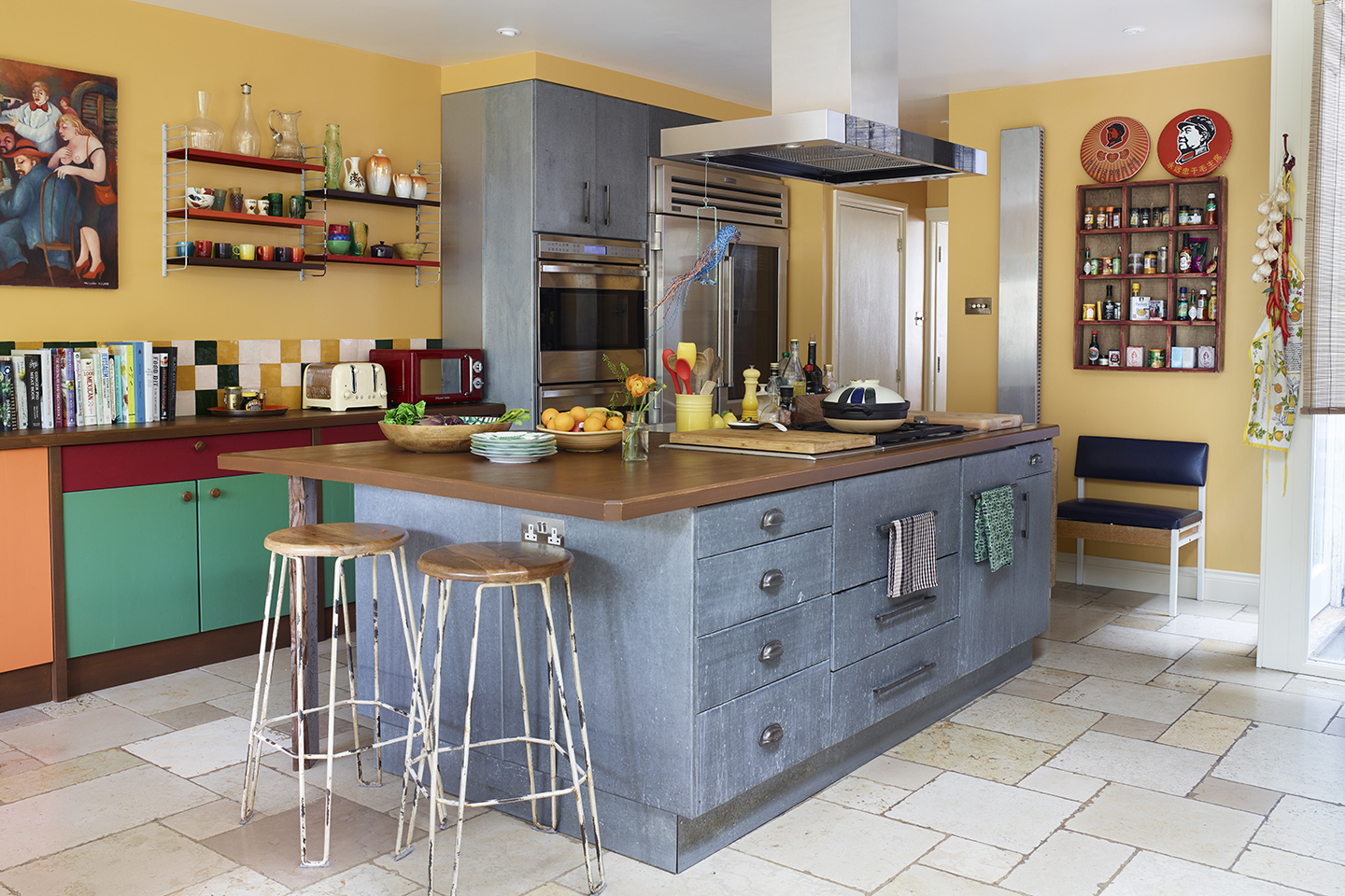 yellow kitchen with blue island