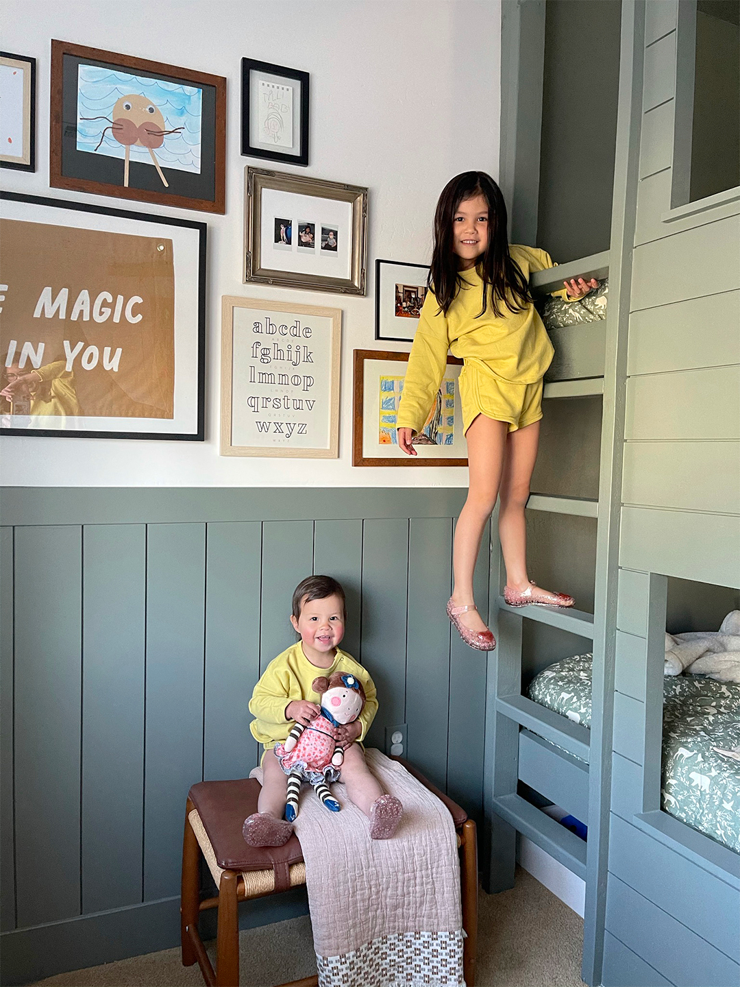 girls hangign on bunk bed