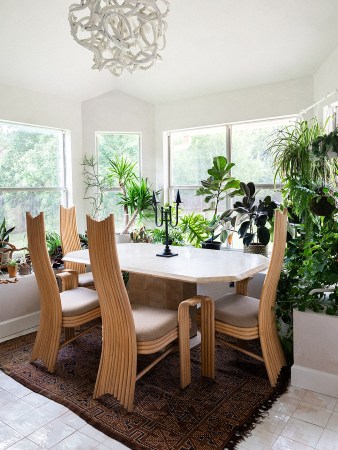 dining room with high back rattan chairs