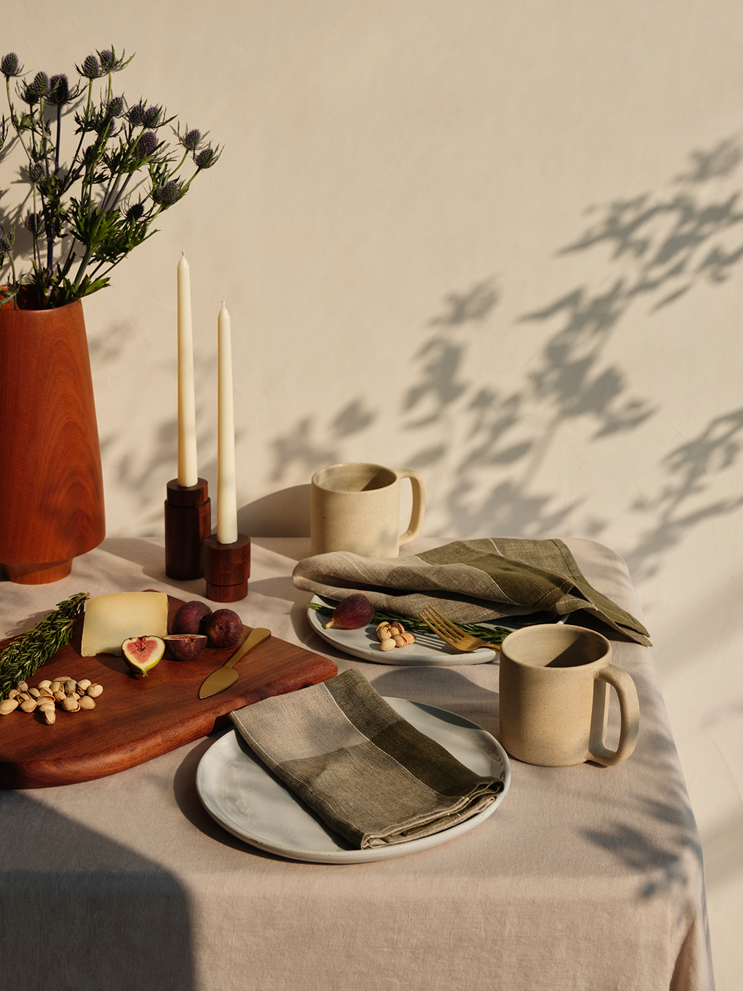 neutral tablescape with wood candlesticks